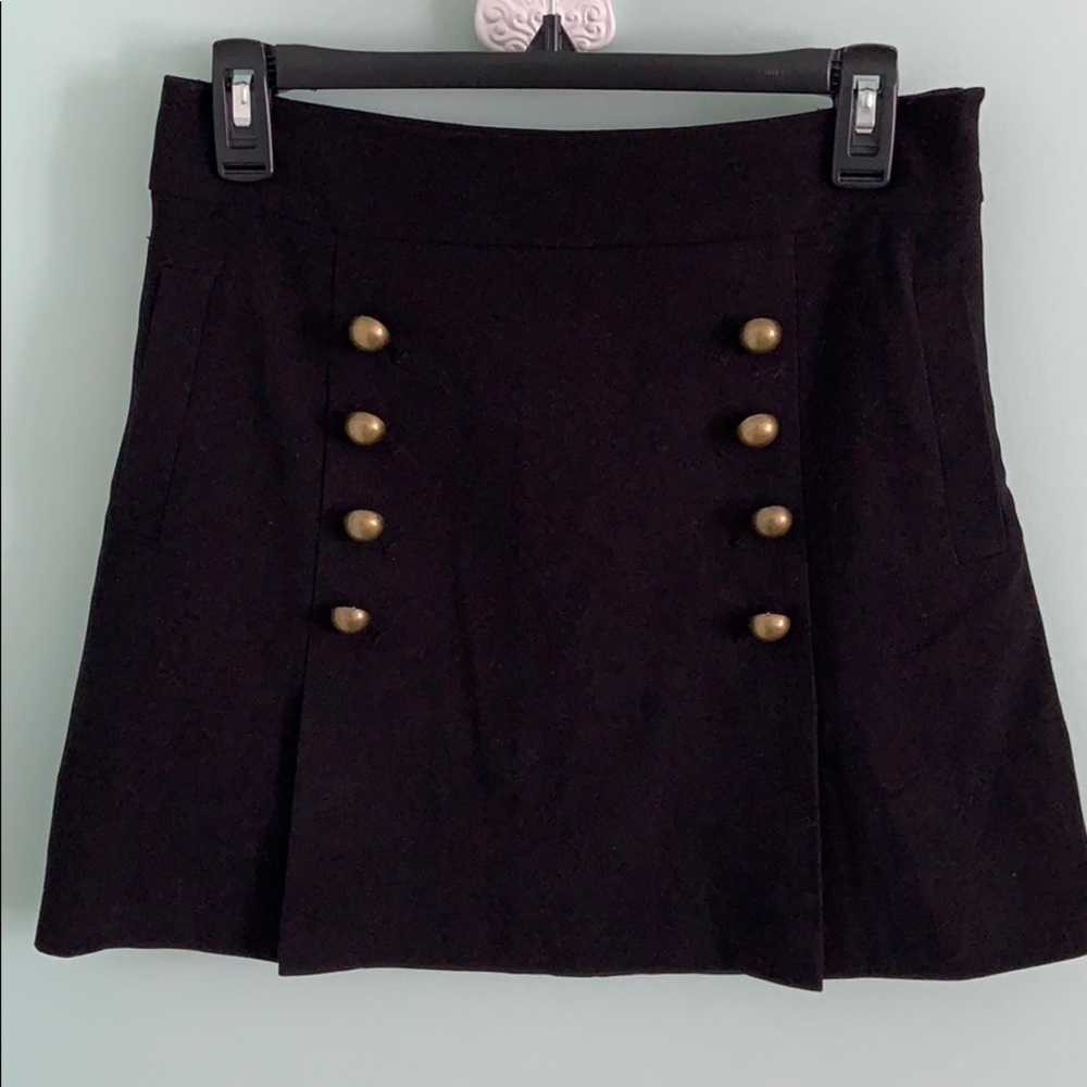 black skirt w gold dot things